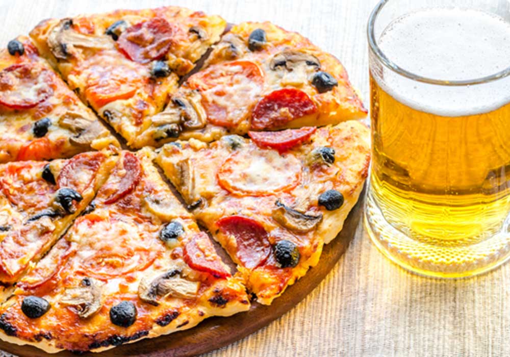 Discover the perfect drink to pair with your next pizza order!
